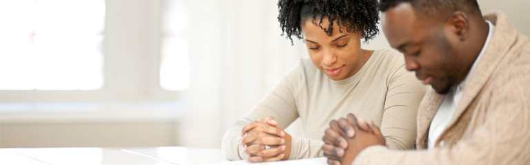 Wife prays for her husband