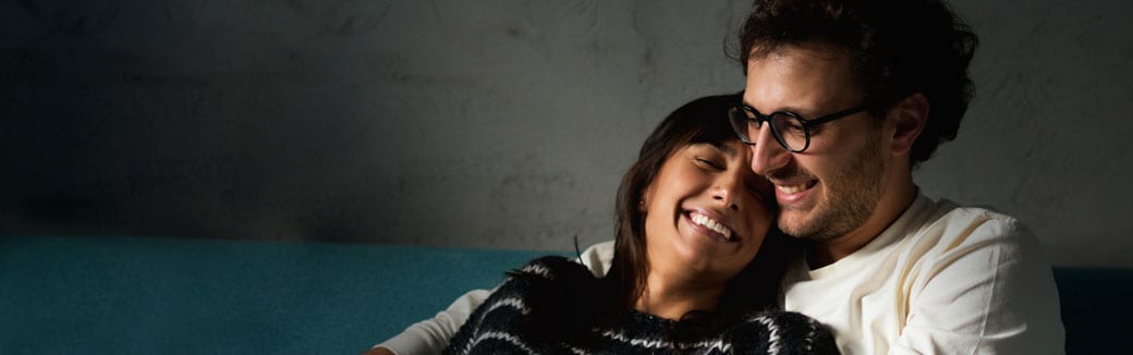 couple sitting together smiling
